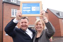 Sales Adviser Richard Matthews and Sales Manager Catherine Hand celebrating David Wilson Homes’ first ‘A’ rated homes at its Pop