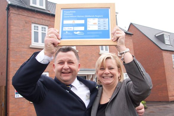 Sales Adviser Richard Matthews and Sales Manager Catherine Hand celebrating David Wilson Homes’ first ‘A’ rated homes at its Pop