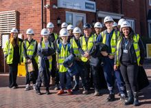 Holly Rose, Marketing Manager and volunteer Enterprise Adviser (far left), and Dave Auker-Howlett, Bricklaying Apprentice Master (centre wearing a black hat) welcomed members of staff and students from King Edward VI Balaam Wood Academy to Elgar Park to h