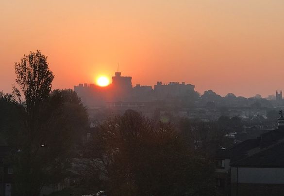 Seen from Castle View the sun rises of Windsor Castle Seen from Castle View the sun rises of Windsor Castle