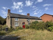 1 and 2, Milebarn Cottages, Holt Road, Llan-y-Pwll, near Wrexham sold for £252,000.