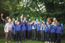 Pupils from St Mary's Catholic Primary School with homeowners at Brookfields House, an Adlington Retirement Living community