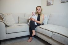 Maddy and Miller sitting down inside their brand new home