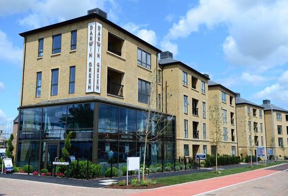 The Darwin Green marketing suite with a cycle path outside