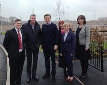 David Cameron poses for a photo with Redrow Homes (Lancashire) staff, from left: Jon Kane, sales consultant, Steve Greenhalgh, m