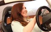 3- Carole Davies tries out the driver training simulator