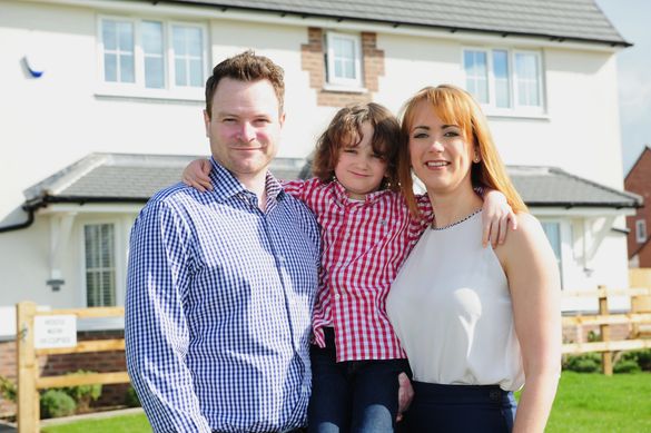 Daryl and Emma Hurley, with son Oscar outside their new home at The Wickets.