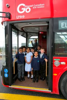 Pupils from Riverside Primary School at the new bus stop at Riverside Campus: Eduard Boian, Maya Ali, Sarim Abakar, Inaaya Abdullah, Isiah Henry, Teddy Donovan, Alusine Kallon